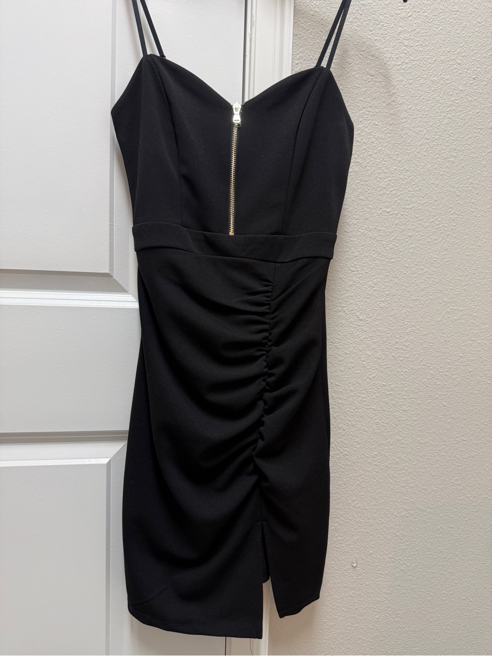 Emerald Sundae Black Ruched Mini Dress with Gold Front Zip